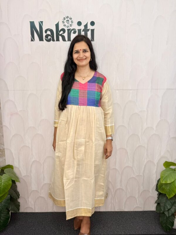 WhatsApp Image 2026-08-09 at 4.22.33 PM Onam special kurti with madras check design